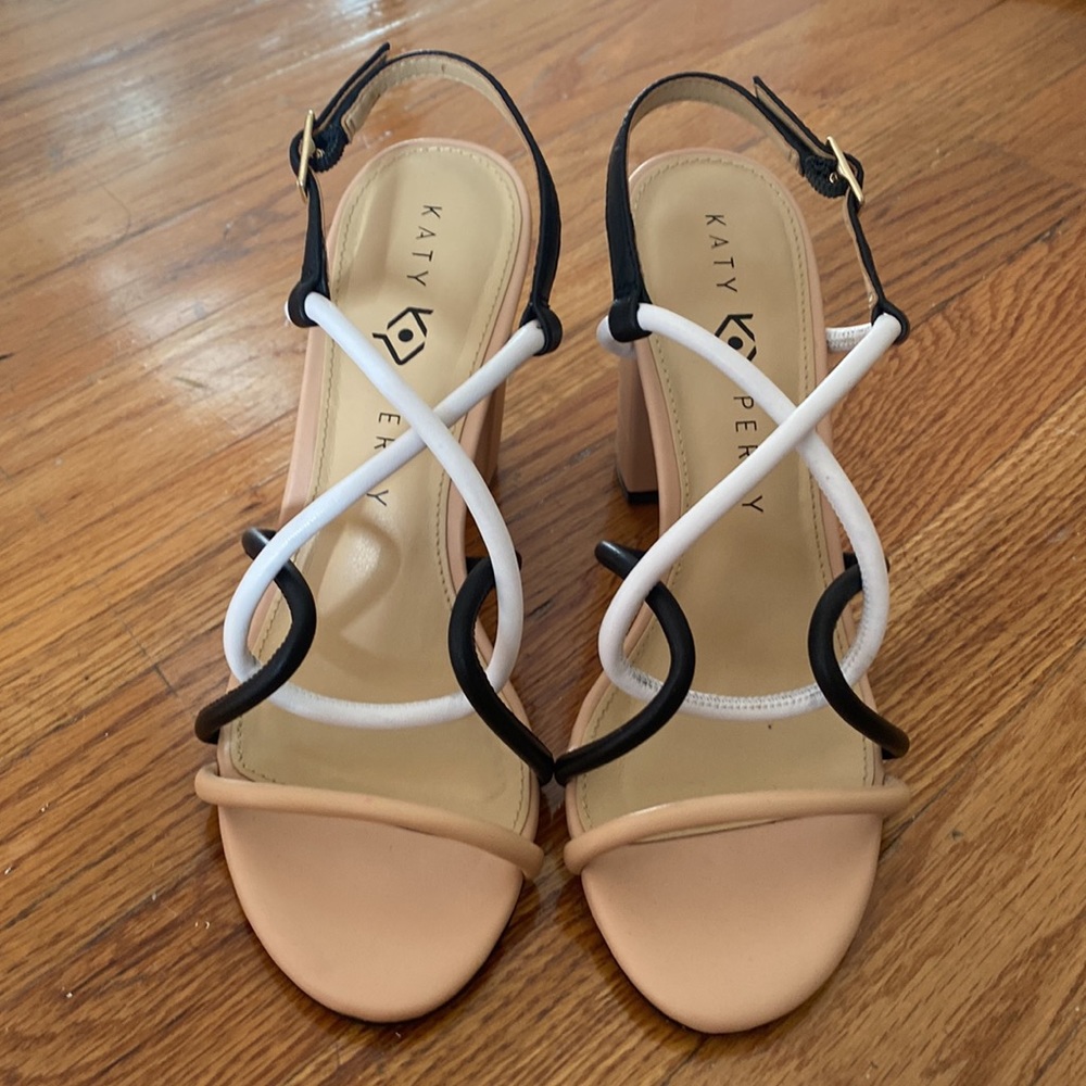 Nude heels with black and white straps